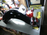 Oem 97-08 Harley Touring Road King Electra Rear Fender Tail Light W/ License Brk. Fixed Price $299.99.