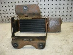Suzuki 1973 77 Battery Box Holder Bracket Support Oem. Fixed Price $49.99.