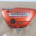 Oem Suzuki Titan Right Side Oil Tank Reservoir Emblem Badge Cap GT500 1974. Fixed Price $119.00.
