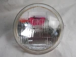 Suzuki, Nos, TS100, TS125, TS185, TS250, Headlight Lamp Unit # 35121-29610. T2. Fixed Price $189.99.
