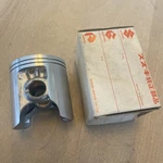 Genuine Suzuki RM125 1986-1988 Piston. 0.50 O/s 12110-14513-050 Nos. Fixed Price $54.51.