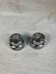 Genuine Harley Davidson Take Off Front Axle Nut Covers 44148-07A. Fixed Price $41.00.