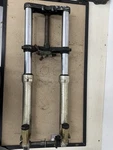 1986 Suzuki Front End Forks W Triple Tree 1987 1988. Fixed Price $200.00.