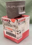 New Genuine Yamaha 21V-11636-00 Piston O/s 050. Fixed Price $49.70.