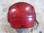 Tail Lamp Assembly 1976 Kawasaki KZ400. Fixed Price $49.99.