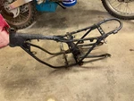 74-76 Honda XL-70 Frame And Swingarm, 50100-137-670B. Fixed Price $125.00.