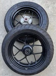 Scooter Wheels/ Tires 130/70-12 Rear- 120/70-12 Front Michelin W/honda Rim. Fixed Price $313.49.