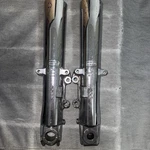 Chrome Hd Showa G5B3-10-L(SA3) & G5B3-10-R(SA-5) Lower Fork Sliders Pair. Fixed Price $240.00.