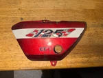 71 Suzuki TS-125 Left Side Panel Oil Tank Cover,. Fixed Price $59.00.