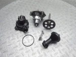 2004 03-06 Kawasaki ZR1000A1 Z1000 Engine Oil Water Pump Gear Housing Lot. Fixed Price $74.39.