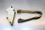 1986 Suzuki RM125 Chain Defense Buffer W/ Guide 61273-26C00 61341-01B03. Fixed Price $50.00.