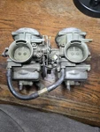 Keihin Twin Carburetors, # 747A No Other Markings Visible. Honda ??. Fixed Price $64.99.