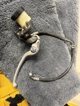 Suzuki 2014 Nissin Front Brake Lever Switch Assembly. Fixed Price $75.00.