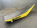 2006 Suzuki RMZ250 RM-Z250 Oem Seat Saddle Cover Pan K5306-60080-12A. Fixed Price $69.99.