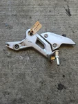 2023 Cfmoto Front Left Foot Peg Mount Bracket Rest. Fixed Price $199.91.