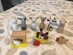 Hearth & Hand With Magnolia 7 Wooden Farm Animal Figurines W/rabbit Hutch Wheel. Fixed Price $18.28.