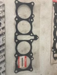 New Nos Oem Suzuki Base Gasket 11241-17E00. Fixed Price $20.00.