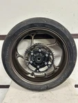 2020-2025 Triumph Street Triple 765 Rs Rear Wheel Straight W/ Tire Bronze Oem. Fixed Price $680.00.