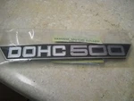 Nos Oem Yamaha Side Cover Emblem 1973-74 TX500 1975 XS550 Street 371-21787-00. Fixed Price $14.44.