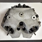 06-5507 RH1 Cylinder Head Norton Commando 750 9.0 30MM Used 1968 1972. Fixed Price $275.00.