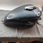 1984 Honda Nighthawk 650 Gas Fuel Tank Cover Holder?. Fixed Price $195.00.