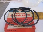 13024-025 Nos Kawasaki W1 W2 650 Piston Ring Set .040 Over OM27. Fixed Price $75.00.