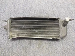 1986 Suzuki RM125 Left Side Radiator 17720-01B00. Fixed Price $28.00.