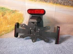 Zero Sr/s License Plate Holder W/ Reflectors Led Tag Light 24-08528 65-08022 B3. Fixed Price $79.20.