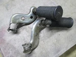 Harley Davidson Foot Rest Bracket Set OEM#52674-41, 52676-41. Fixed Price $100.00.