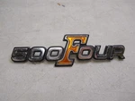 Honda Nos CB500, 1971-73, Side Cover Emblem, # 87124-323-000. S-156/1. Fixed Price $39.99.
