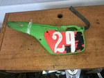 84,85 Kawasaki KX-80 Left Side Panel, 36001-1400-AE. Fixed Price $75.00.