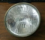 New Yamaha Headlight 77-79 XS750 80-81 XS850 1J7-84330-62-33 997-16121. Fixed Price $54.92.