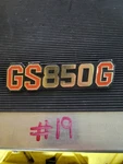 80-81 Suzuki GS850G Side Cover Badge Emblem 68131-45100. Fixed Price $33.00.