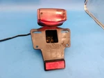 1993-2006 Honda Taillight License Plate Bracket No Cracks. Fixed Price $99.00.