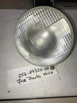 Yamaha TX650 XS1 XS2 Head Lamp Lens 256-84320-60-00 New Old Stock For Parts Only. Fixed Price $99.00.