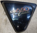 Honda CB650A Custom 1980-1982 Left Side Cover 83710-460 4FL. Fixed Price $140.00.