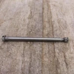 1980 Suzuki GS450L Front Axle W/ Nut. Fixed Price $24.00.
