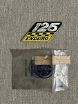 New Oem Yamaha 1970 AT1B ATM1B Oil Tank Emblem "enduro" 125 261-21787-00-00. Fixed Price $39.99.
