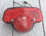 Norton Commando 750 850 Rear Lamp Oem Lucas Used Part P/n 56331 1971-75. Fixed Price $135.00.