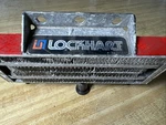 Lockhart Oil Cooler Vertical Frame Ironhead Evo Shovelhead Patent 233984 Chrome. Fixed Price $44.00.