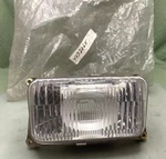 Polaris 4032065 Headlight, Asm., Incandescent, W/bulb, Seal New Replaces. Fixed Price $134.93.