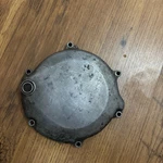 1994 - 1998 Kawasaki KX125 Oem Outer Clutch Cover Housing. Fixed Price $20.00.