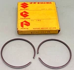 New Genuine Suzuki 12140-25710 Piston Ring Set Fits 1976 TS90 TC90. Fixed Price $8.30.