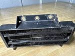 Lockhart Oil Cooler Vertical Frame Ironhead Evo Shovelhead Patent 233984 Black. Fixed Price $75.00.