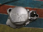 1986 Suzuki RM125 Crankcase Clutch Cover Right Outer 11341-01B11. Fixed Price $50.00.
